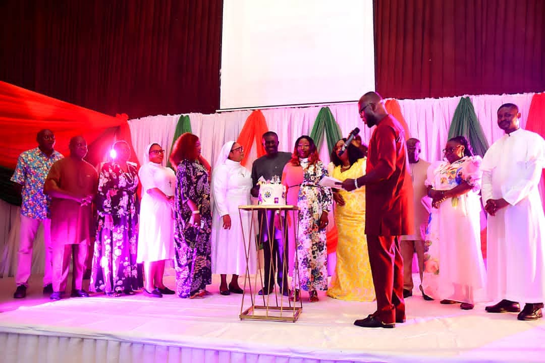 Cutting of the Foundation Cake, with Rev. Father's, Rev. Sr's, Prof. Mrs Ufuoma Oyinvi, Hon. Sesoo Gboko House of Rep members wife, my dear husband, my elder brother and his wife Mrs Josephine Udo and a host of all.