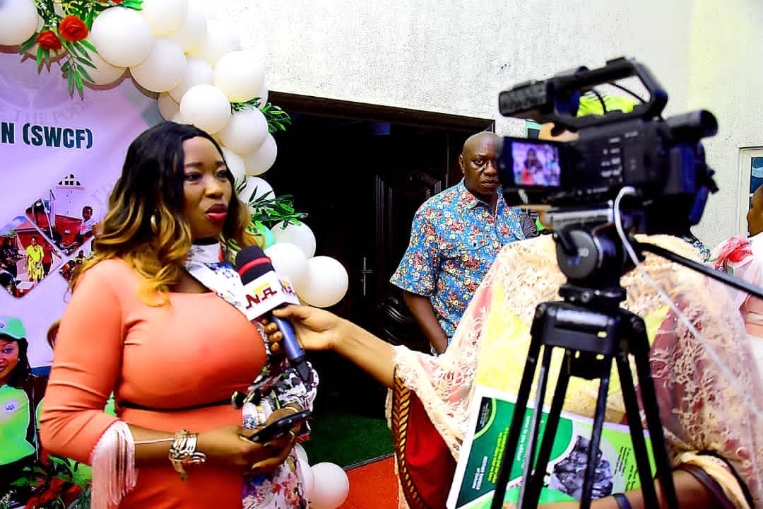 Responding to media crew interview.