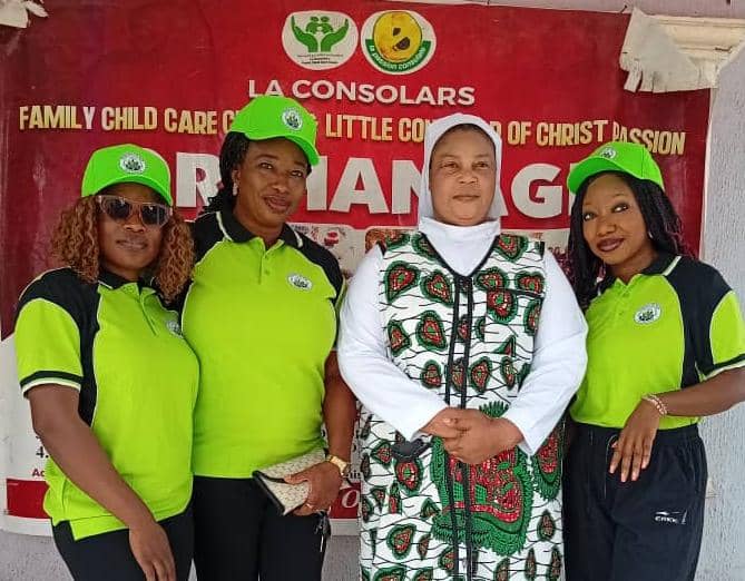 Visitation to Little Consolar of Christ Passion Orphanage Home Behind City College of Education, Old Karu Road, Karu, Nasarawa State, by Strength Way Charity Foundation SWCF Photo taken with, the In Charge, Rev. Mother Merabelle V. Godwin.